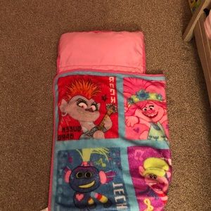 Sleep blanket with built in pillow